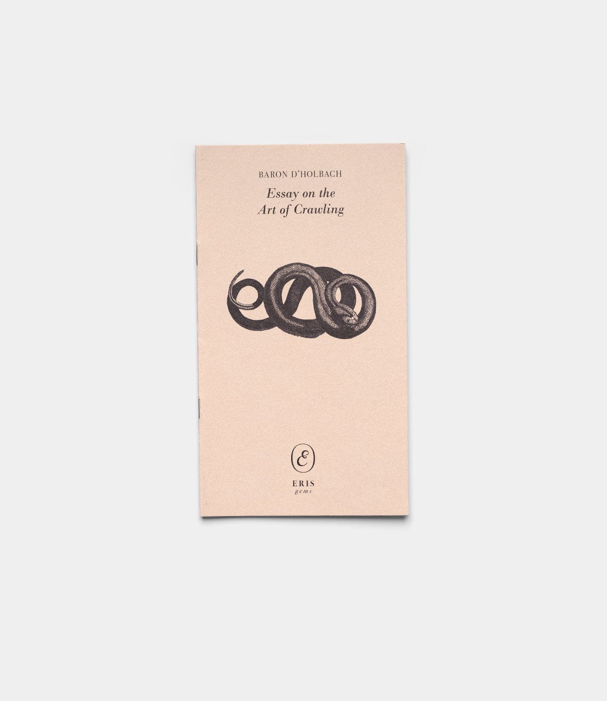 A beige booklet titled "Essay on the Art of Crawling" by Best Made Co., featuring a coiled snake illustration and logo below the title, displayed against a plain white background.