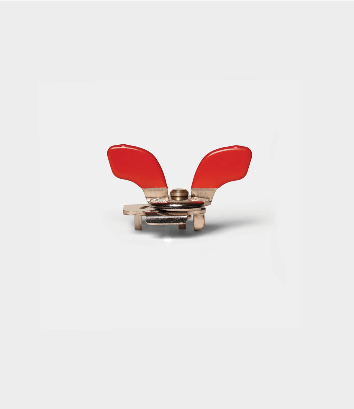 Nogent French Can Opener with two bright red wing-shaped handles.