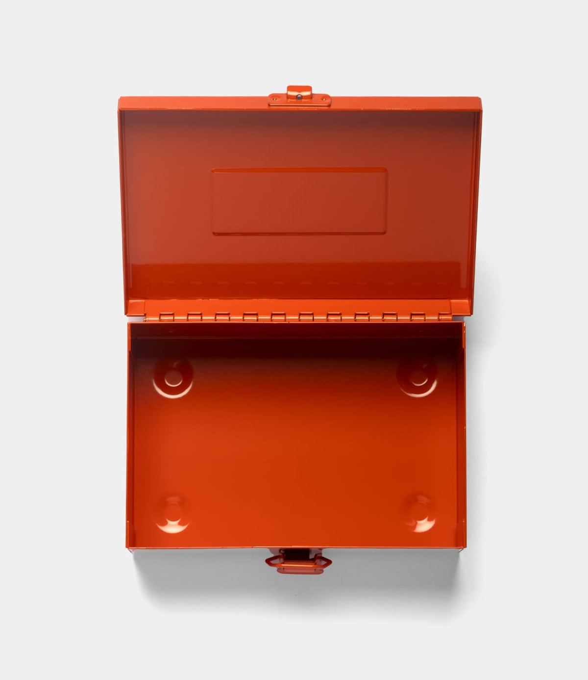 The Best Made Co. Type 6 Strongbox Orange is an empty, rectangular American steel box with a hinged lid and front latch, shown open from above against a light gray background.