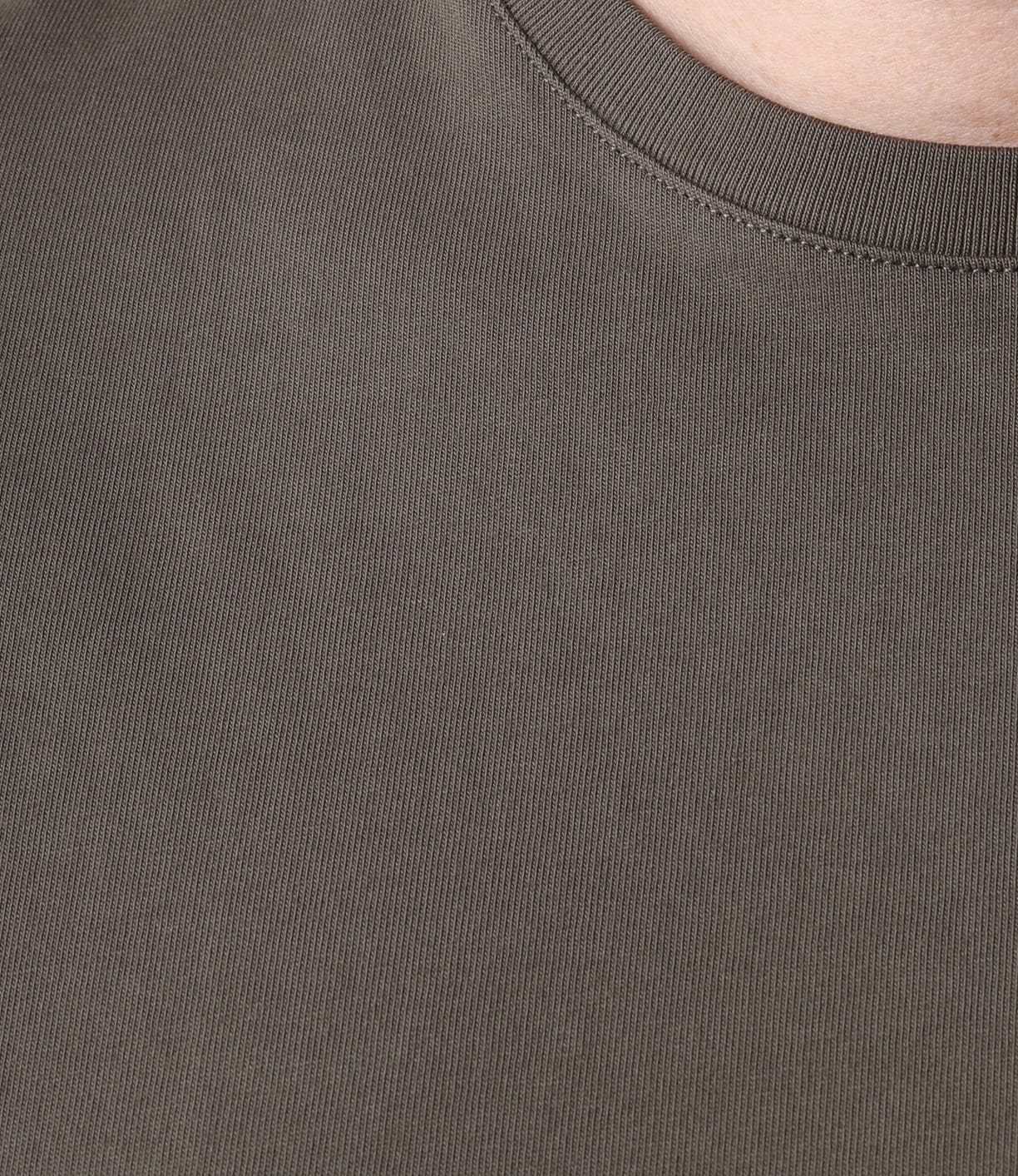 Close-up of the Best Made Co. Standard T-Shirt Field Drab, showing its fine ribbed texture and collar stitching detail in a plain olive-green color.