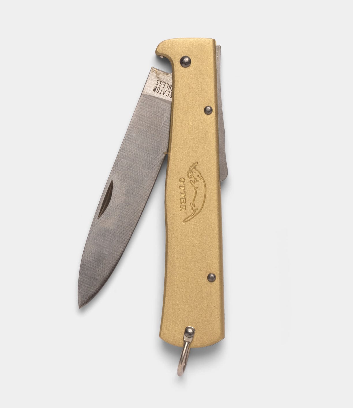 The Best Made Co Brass Mercator is a folding pocket knife with a brass handle, one partially open stainless steel blade, an engraved Otter Messer logo and "OTTER," plus a keyring at the base.