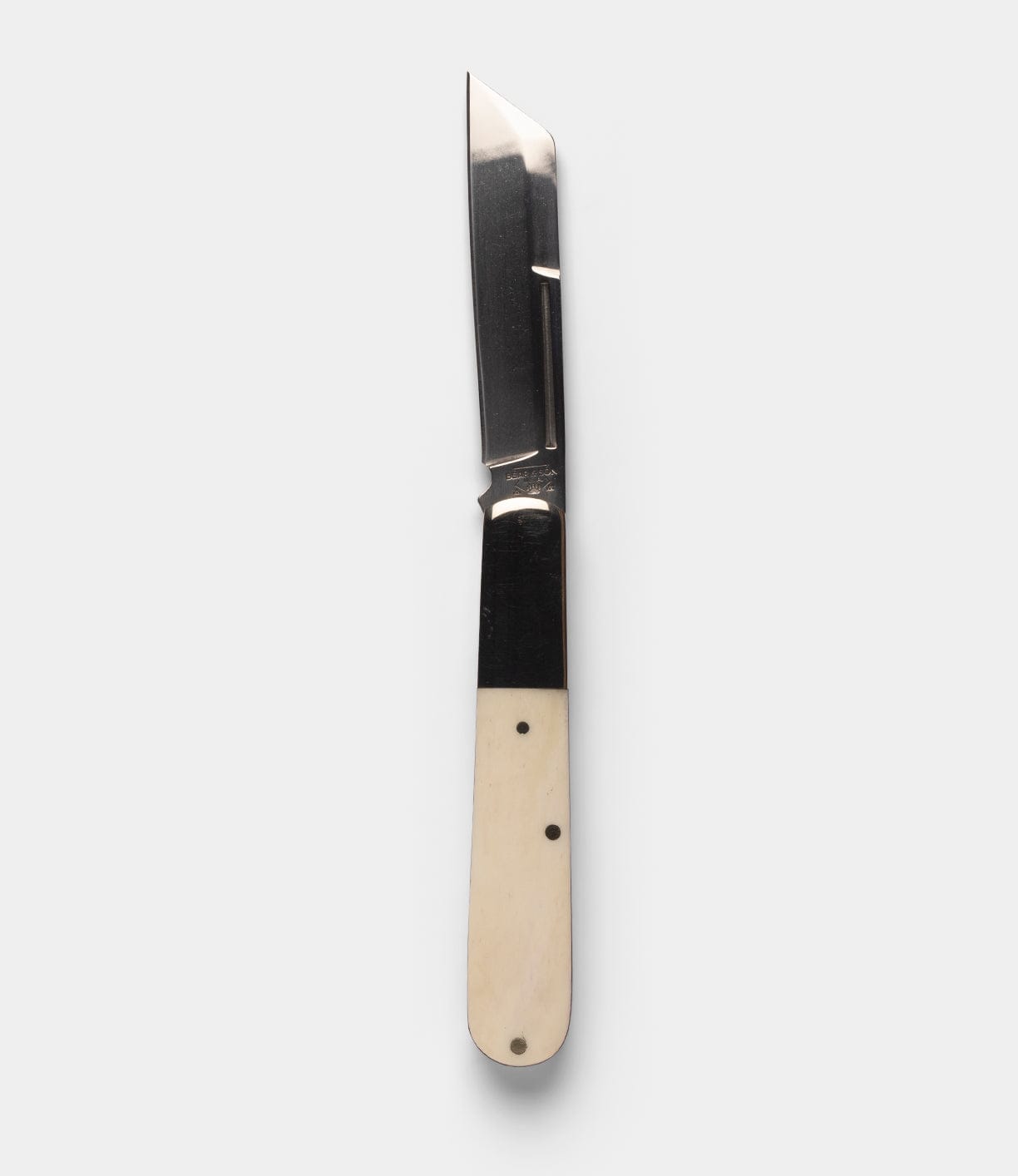 The Best Made Co Barlow Knife features a polished stainless steel blade and a smooth, cream-colored bone handle, shown against a plain white background.