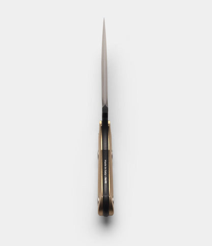 The Best Made Co. GiantMouse GMF1-P (BMC Edition) is shown from above with its blade open and upward, highlighting its slim brass-handled profile and minimalist design against a plain white background.