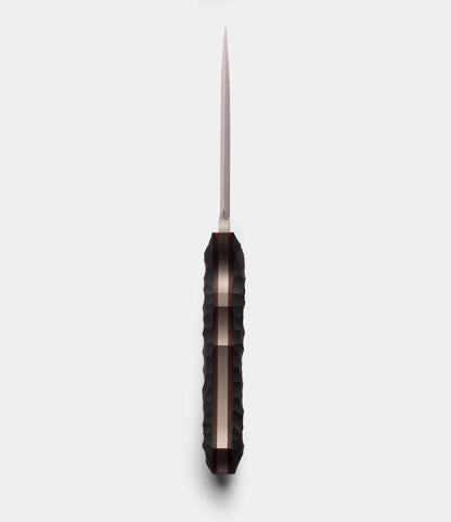 A close-up of The Field Knife (BMC Edition) by Best Made Co, featuring a fixed blade crafted from D2 tool steel.