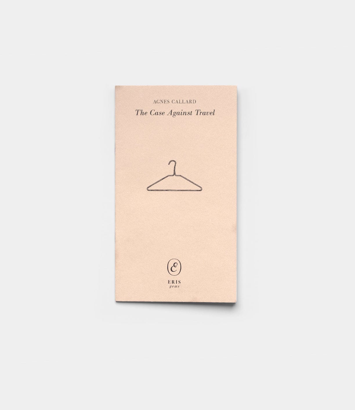 The Case Against Travel by Best Made Co. is a beige book featuring a central line drawing of a clothes hanger on a plain white background, with the brand logo below.