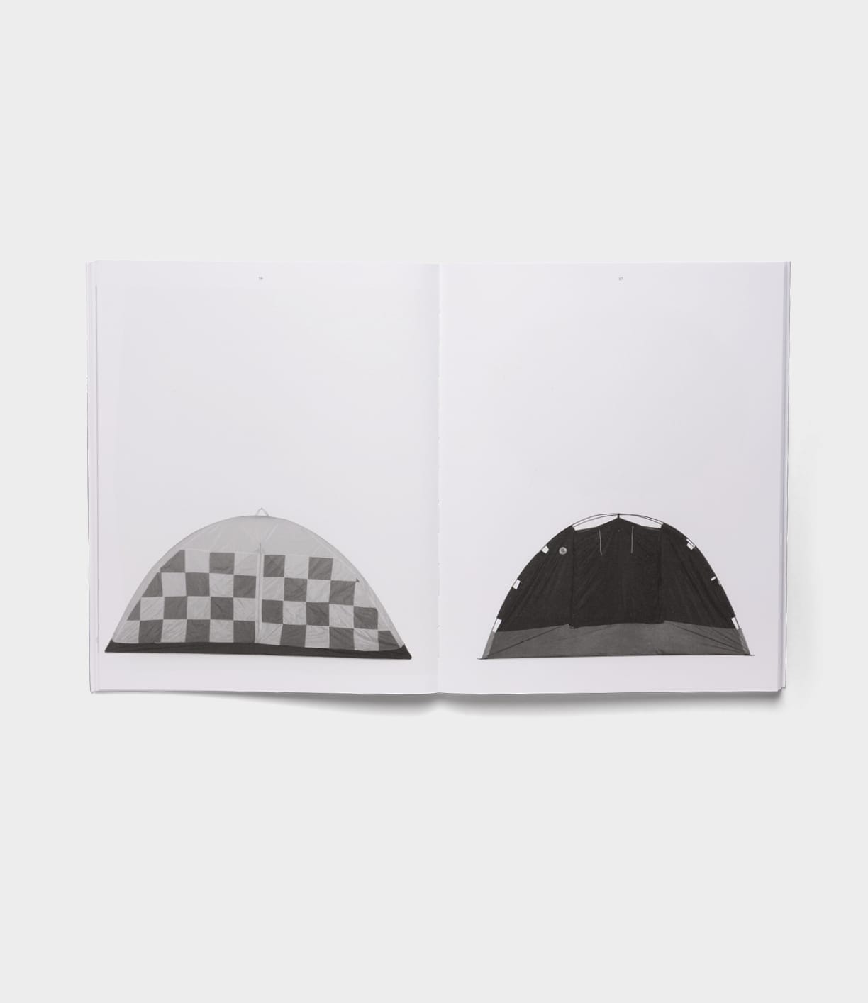 An open copy of "The Camping Tent" by Best Made Co. displays two black and white tent photos—one with a checkered pattern on the left and one with light spots on a dark surface on the right—set against a white background.