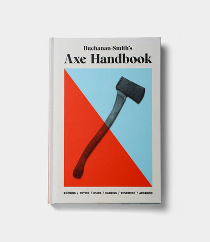 Buchanan-Smith’s Axe Handbook (signed) by Best Made Co. showcases a bold axe cover on a split red and blue background, with a subtitle about knowing, buying, using, hanging, restoring, and adorning axes.