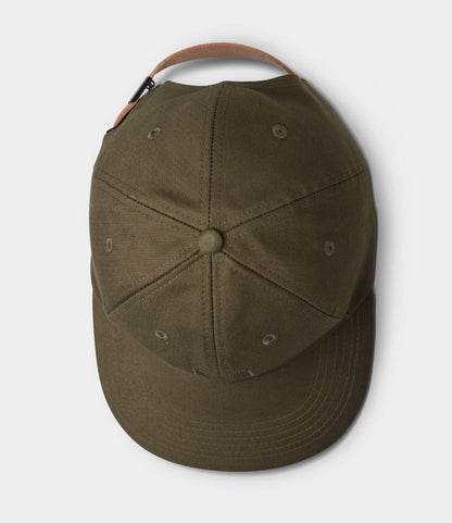 Best Made Co. Military Cord Ball Cap in olive drab, shown from above with stitched panels, ventilation eyelets, and a brown leather adjustable strap with metal clasp at the back.