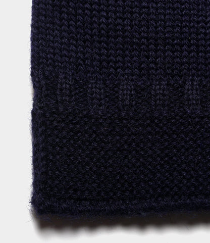 Close-up of a dark navy blue ribbed edge on the Best Made Co. Guernsey Sweater, highlighting traditional seamless knitting and classic texture against a plain white background.