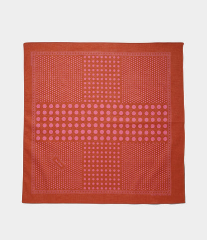The Best Made Co. Trademark Bandana Red features a square design with red and pink polka dots in vertical and horizontal bands on a solid red background, finished with a decorative border and neat selvedge edge.