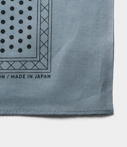 A close-up of the Trademark Bandana Blue by Best Made Co. shows light blue fabric with black dots, grid lines, and "MADE IN JAPAN" in black near the selvedge edge.