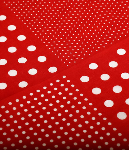 The Semaphore Bandana by Best Made Co. features red fabric with diagonally arranged white polka dots in varying sizes and densities, crafted on vintage shuttle looms for timeless quality.