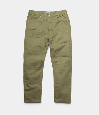 The Best Made Co. Field Pant Special Edition Olive Drab features straight legs, front and back pockets, metal rivets, and visible stitching in olive cotton twill, shown laid flat on a white background.