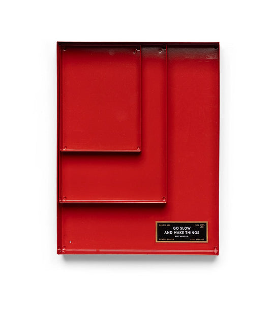 A red Spare Parts Tray from Best Made Co’s 