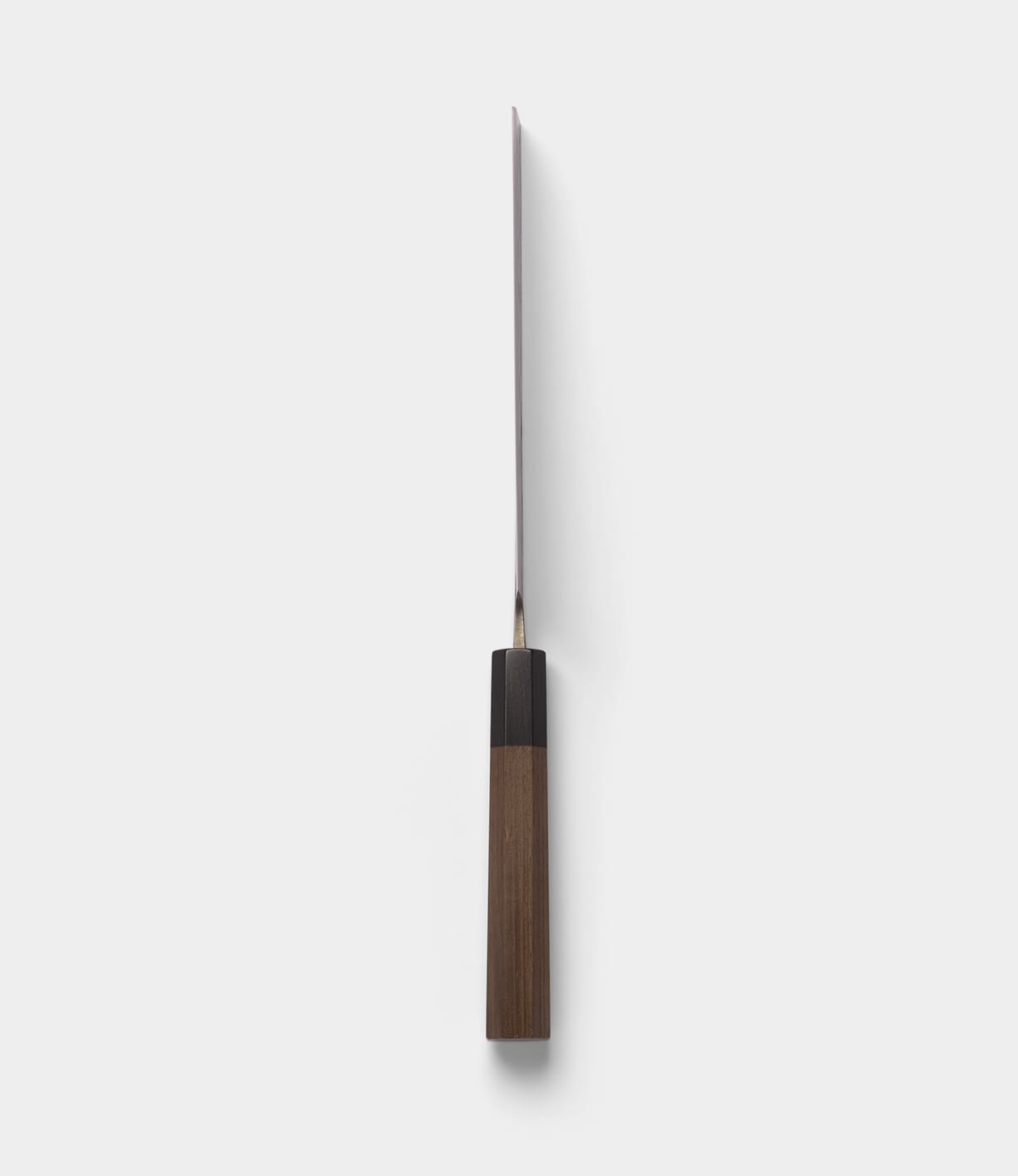 A Best Made Co. Aogami Nakiri Knife viewed from above, highlighting its thin Blue Paper Steel No. 2 blade and rectangular wooden handle against a plain white background.