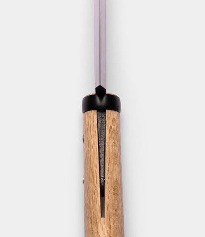 Close-up view of the Azuma Hatchet by Best Made Co., featuring a wooden handle and a carbon steel blade, positioned vertically against a plain white background—showcasing the refined Japanese craftsmanship of this exceptional tool.