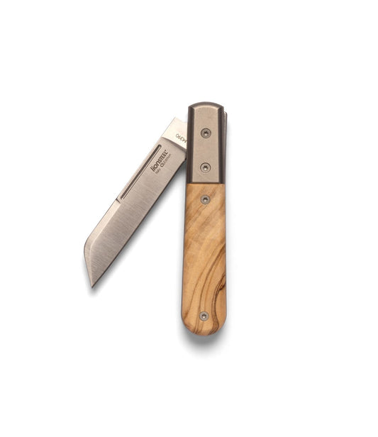 The Best Made Co. Italian Barlow is a folding pocket knife with a straight-edged M390 stainless steel blade and wooden handle, shown partially open against a plain light gray background. Inspired by the classic Barlow knife design.