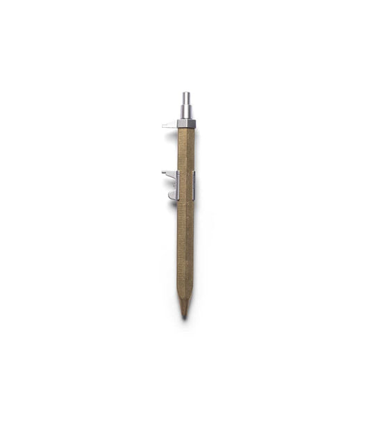 The Best Made Co. Brass Messograf Pen, with its industrial design, metal clip, and knurled push button, stands vertically against a plain light gray background.
