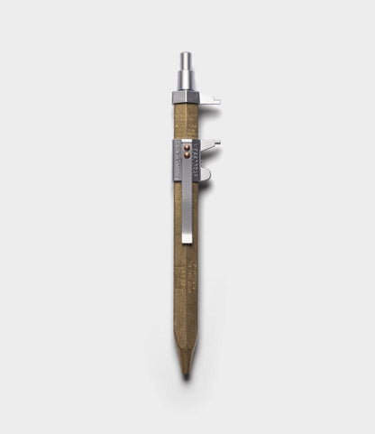 The Best Made Co. Brass Messograf Pen with a hexagonal brass body, metal clip, and exposed push button stands vertically on a plain white background.