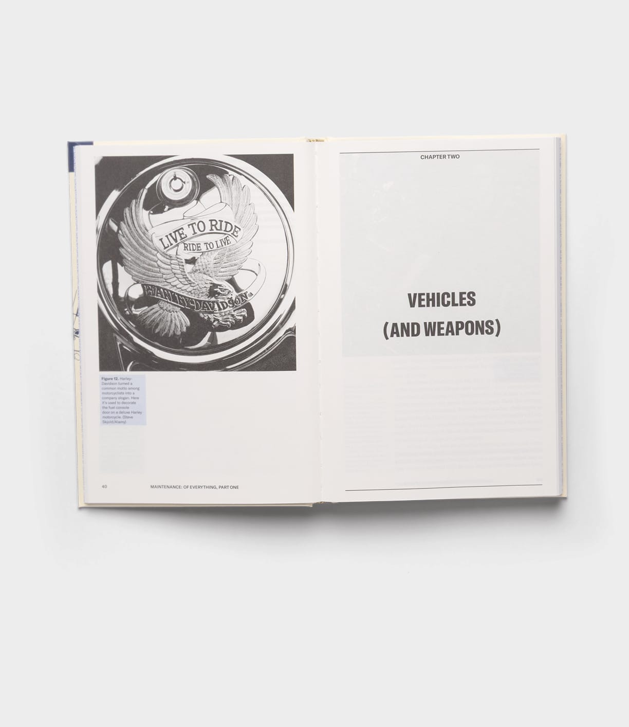 An open book from Best Made Co.'s "Maintenance of Everything" displays a black-and-white photo of a Harley-Davidson part engraved with "Live to Ride, Ride to Live," and a chapter titled "CHAPTER TWO VEHICLES (AND WEAPONS)," evoking maintenance themes.