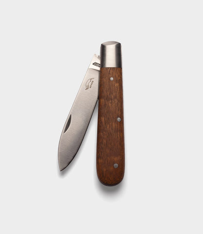 A Best Made Co. Otter-Messer Pocket Knife with a sapele handle and a partially open stainless steel blade, displayed on a plain light gray background.