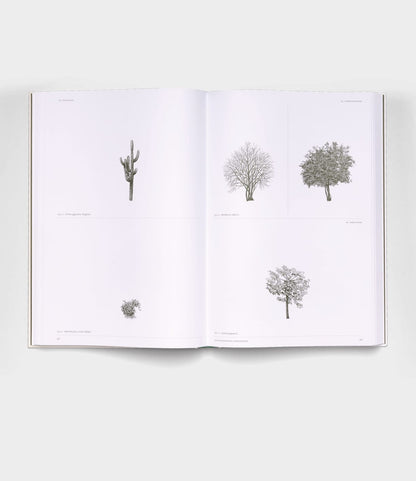 An open copy of The Architecture of Trees by Best Made Co. lies flat, showing minimalist tree and plant illustrations labeled with small text, each spaced apart on crisp white pages.