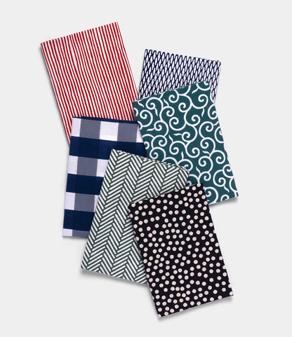 Ami Net Tenugui by Best Made Co. includes six hand-dyed cloth napkins inspired by the chusen technique, featuring red stripes, blue waves, blue grid, white/navy check, green herringbone, and black polka dots.