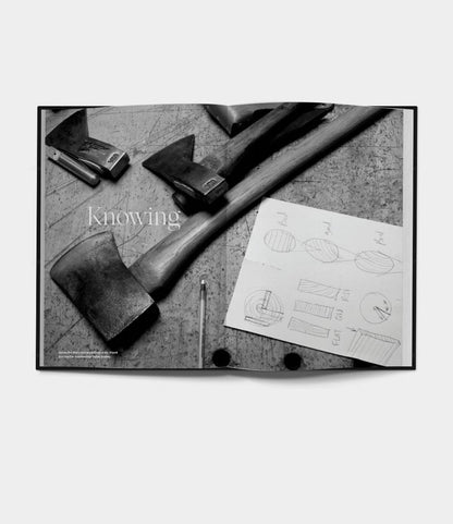 Black-and-white image of three axes, a pencil, and a sketch labeled "knowing," evoking Buchanan-Smith’s Axe Handbook (signed) by Best Made Co. and celebrating the craft of tool design and woodworking.