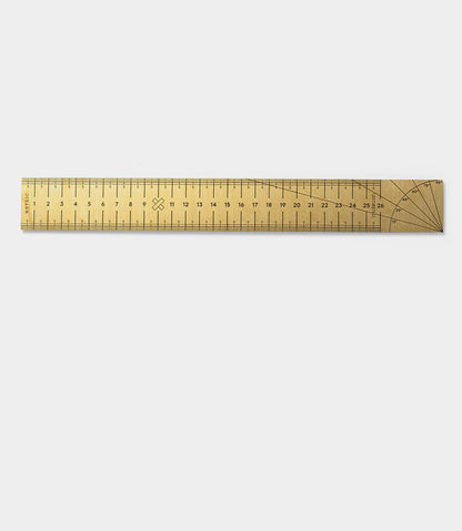 The Measure Twice 12 inch Solid Brass Ruler by Best Made Co., made in the USA, features both centimeter and inch markings, additional angle measurement lines at one end, and is shown on a plain white background.