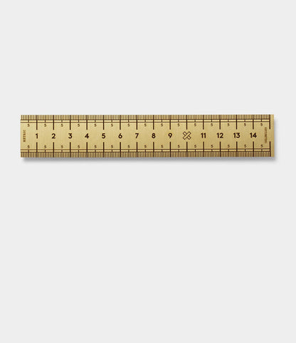 The Best Made Co. Measure Twice 6 inch Solid Brass Ruler, with centimeter and millimeter markings, offers precision measuring. Made in the USA, it is shown on a plain white background.