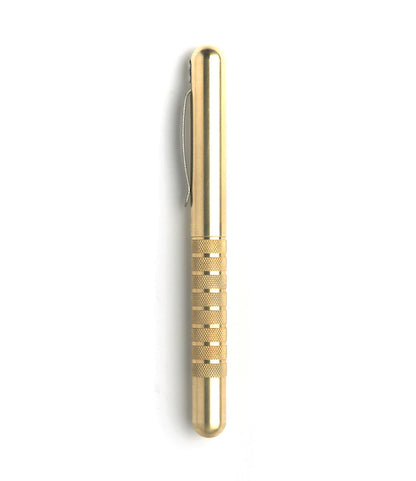 The SUPRA - Fountain Pen by Best Made Co. in gold features a textured grip and pocket clip, shown standing vertically against a plain white background.
