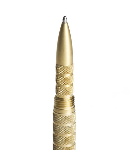 A close-up of the SUPRA - Fountain Pen by Best Made Co. showcases its gold metallic finish and textured grip against a white background. Compatible with Fisher space pen refills for reliable performance.